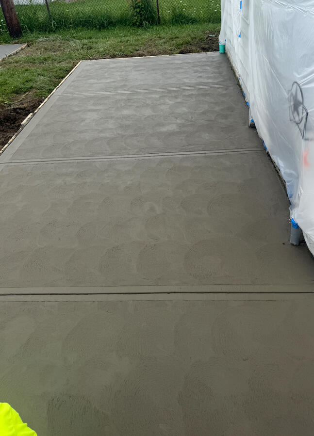 Hand swirled garage patio